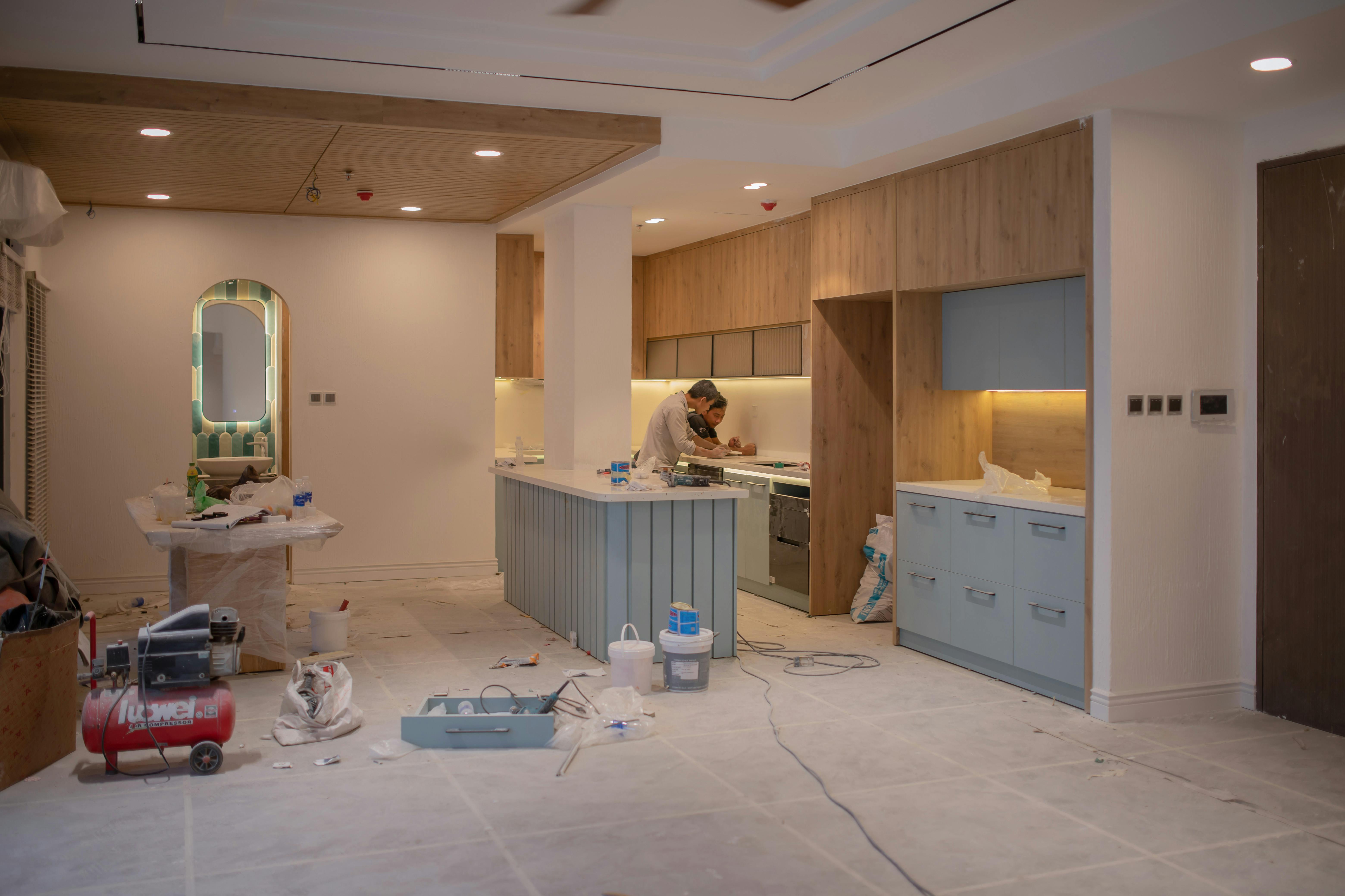 Modern kitchen renovation in Scarborough Toronto with white cabinets quartz countertops and subway tile backsplash